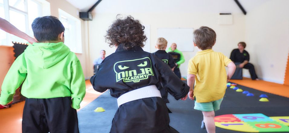 Bern Giam leading a Little Ninjas training session on the mats