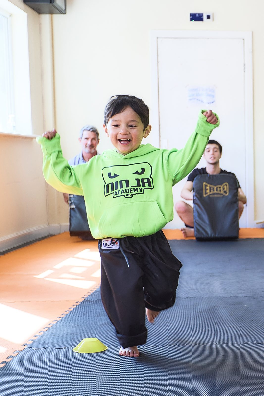 Smiling child attending Ninja Academy martial arts class in Liverpool and West Kirby